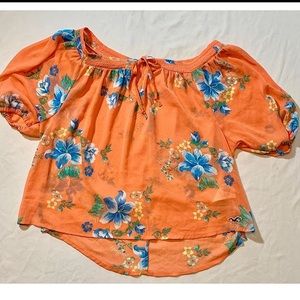 Orange floral blouse